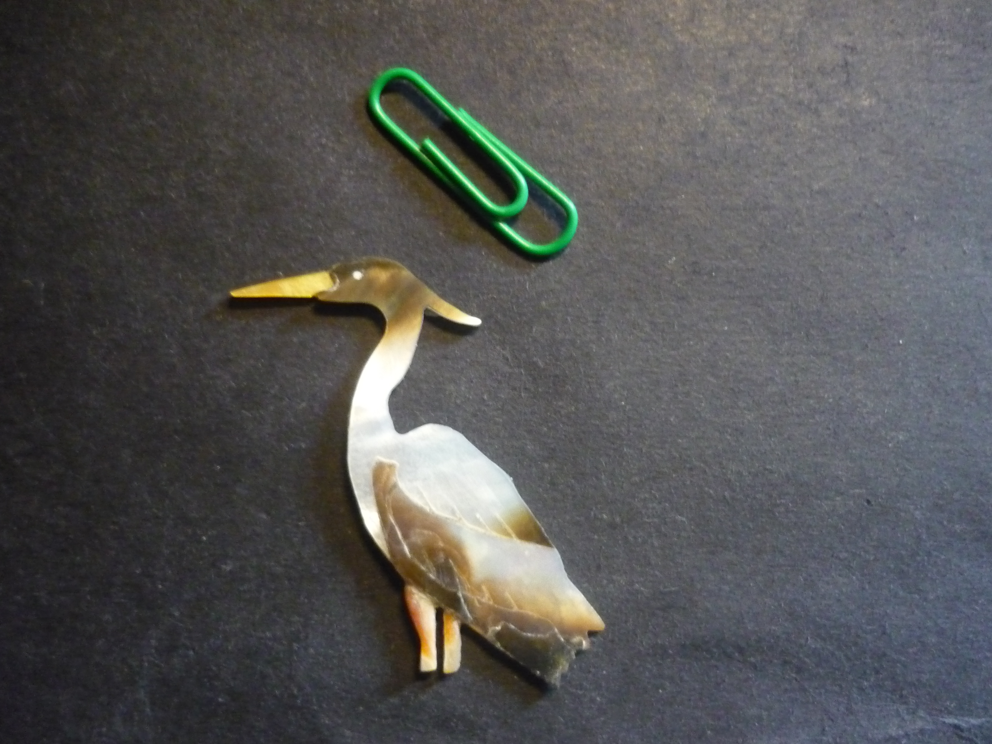 Heron with paperclip